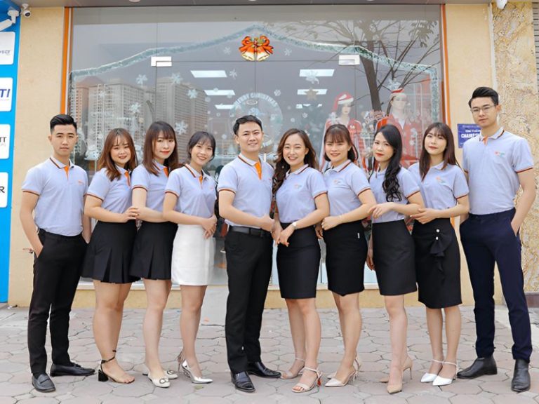 Sơ mi xanh nhạt, váy navy – đồng phục công ty Đồng Phục Vàng